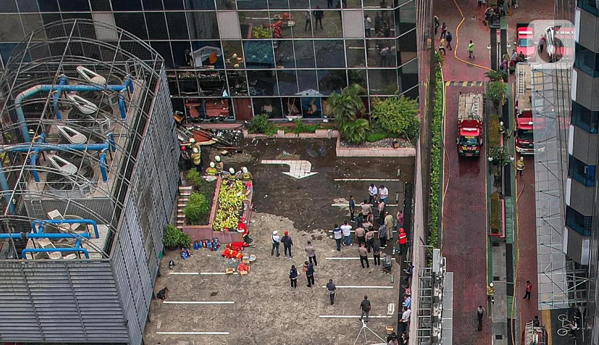 Suasana Gedung Kementerian Hukum dan Hak Asasi Manusia Republik Indonesia (Kemenkumham) seusai peristiwa kebakaran di Jalan Rasuna Said, Kuningan Jaksel, Kamis (8/12/2022). Kebakaran tersebut melanda gudang barang penyimpanan milik negara (BMN). (Liputan6.com/Faizal Fanani)