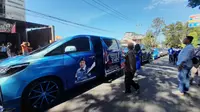 Ratusan Mobil mewah iringi pendaftaran Partai Demokrat ke KPU Banyuwangi (Hermawan Arifianto/ Liputan6.com)