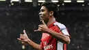Striker Arsenal, Eduardo da Silva merayakan gol dari titik penalti di leg kedua playoff Liga Champions menghadapi Celtic di Emirates Stadium, London, 26 Agustus 2009. AFP PHOTO/Carl de Souza