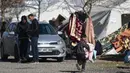 Seorang anak berjalan di sekitar kamp pengungsi Suriah yang didirikan oleh lembaga bantuan Turki AFAD di distrik Islahiye, Gaziantep, Turki, Rabu (15/2/2023). Gempa berkekuatan 7,8 magnitudo melanda Turki dan Suriah pada Senin (6/2), pusat gempa berada sekitar 26 km sebelah timur Kota Nurdagi di Turki pada kedalaman sekitar 18 km di Patahan Anatolia Timur.  (OZAN KOSE/AFP)
