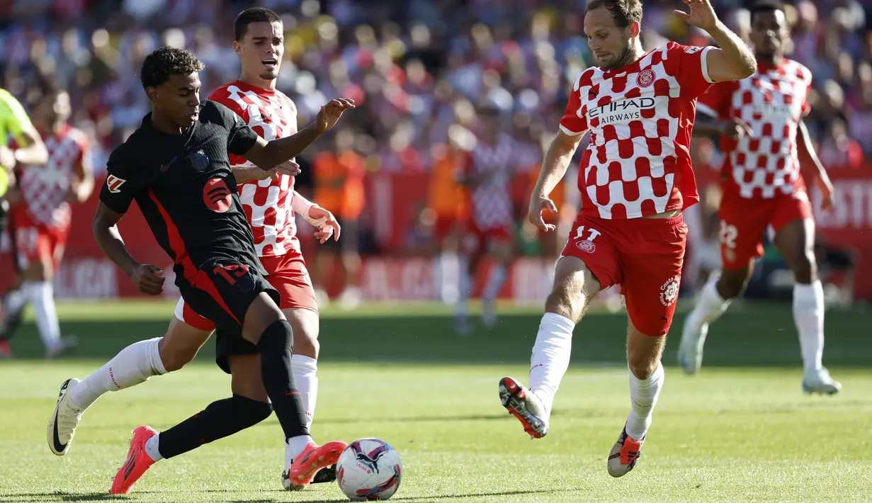 Berkat hasil ini, Barca semakin kokoh bertengger di puncak klasemen dengan poin 15 dari lima laga. Di sisi lain, Girona kini menduduki peringkat tujuh dengan poin tujuh. (AP Photo/Joan Monfort)