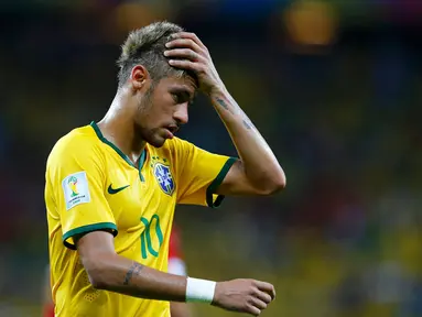 Ekspresi penyerang Brasil, Neymar, usai ditahan imbang Meksiko di penyisihan Piala Dunia 2014 Grup A, Estadio Castelao, Brasil, (18/6/2014). (REUTERS/Marcelo Del Pozo)