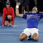 Novak Djokovic rayakan kemenangan atas Rafael Nadal pada final Australia Terbuka 2019. (AP Photo/Aaron Favila)