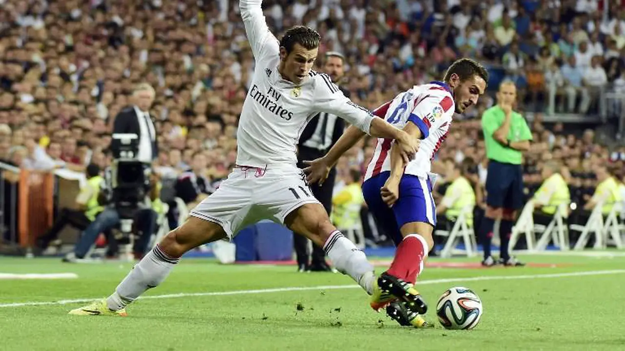 Gareth Bale (Real Madrid) dan Koke (Atletico Madrid)