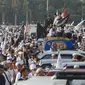 Suasana acara Munajat dan Maulid Akbar 2019 #ReuniMujahid212 di kawasan Monas, Jakarta, Senin (2/12/2019). Dalam acara tersebut, massa turut mendoakan agar Imam Besar FPI Rizieq Shihab segera dipulangkan. (Liputan6.com/Herman Zakharia)