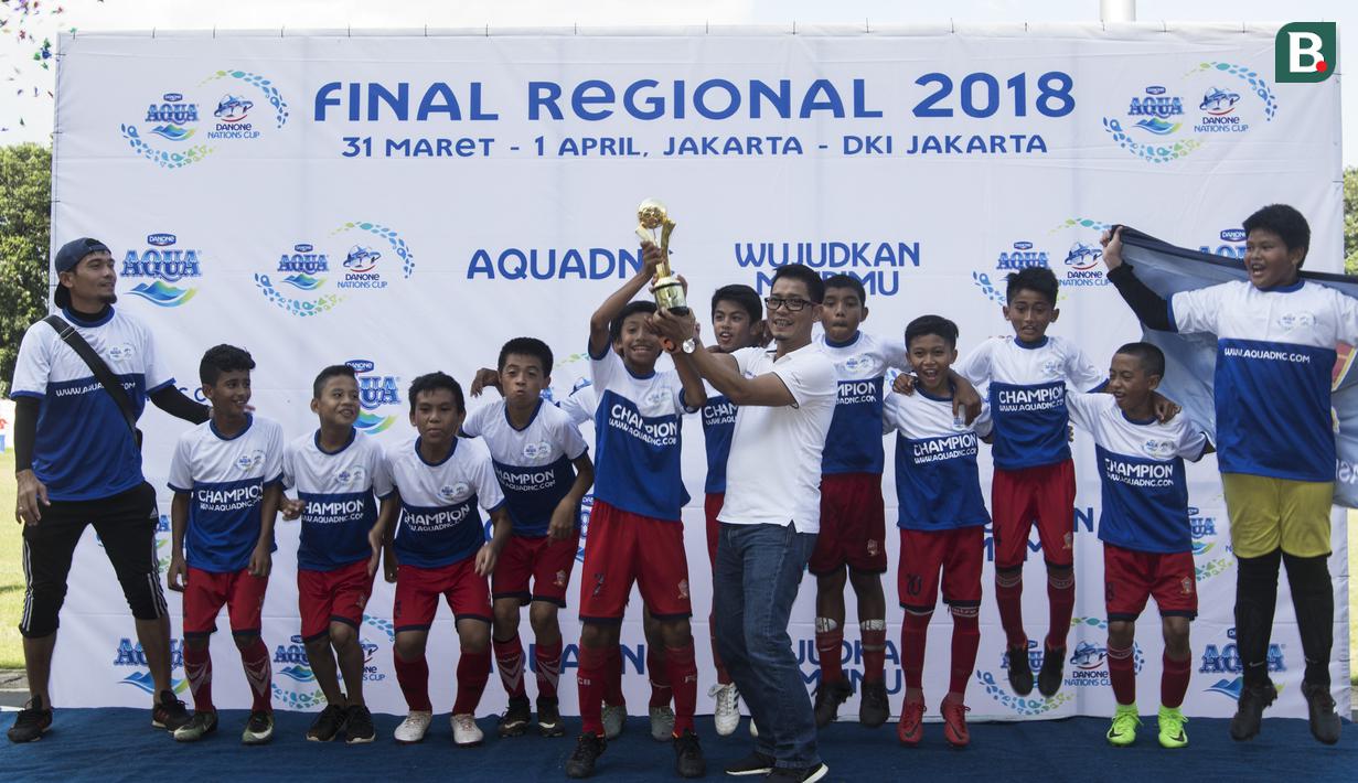Pemain Asiop Apacinti merayakan kemenangan atas Salfas Soccer pada final Danone Nation Cup 2018 Regional DKI Jakarta di Stadion Sunter, Jakarta, Minggu (1/4/2018). Asiop menang 3-0 atas Salfas. (Bola.com/Vitalis Yogi Trisna)