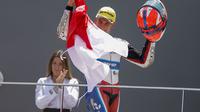 Pembalap Pertamina Mandalika SAG, Carlos Tatay saat finis ketiga pada balapan ketiga ajang Moto2 European Championship di Circuit Ricardo Tormo, Valencia hari Minggu (21/05/2023) lalu. (Dokumentasi Pertamina Mandalika SAG)
