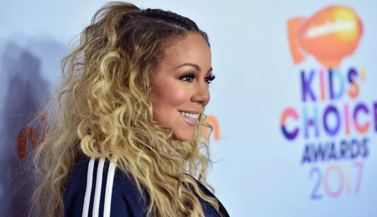 Mariah Carey tumbuh besar di Long Island. Keluarganya benar-benar kesulitan secara finansial setelah bercerai. (Mike Windle  GETTY IMAGES NORTH AMERICA  AFP)