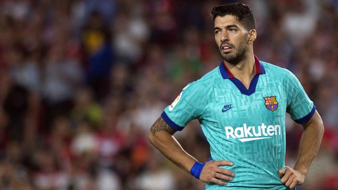 Luis Suarez lesu melihat Barcelona kalah di kandang (AFP)