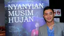 Artis Irgi Fahrezi saat menghadiri penayangan perdana film Nyanyian Musim Hujan di Jakarta, Kamis (29/1). (Liputan6.com/Faisal R Syam)
