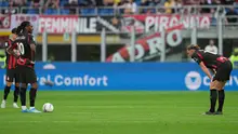 Para pemain AC Milan tampak lesu setelah kemasukan gol pada laga Serie A/Liga Italia antara AC Milan vs Udinese di Milan, Italia, Sabtu, 11 April 2026. (AP Photo/Antonio Calanni)