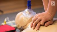 Ilustrasi Foto Pertolongan Resusitasi Jantung Paru atau Cardiopulmonary resuscitation (CPR) (iStockphoto)