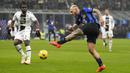 Pemain Inter Milan, Federico Dimarco, melepaskan tendangan saat melawan Udiniese pada giornata ke-15 Serie A 2023/2024 di Stadion Giuseppe Meazza, Milan, Minggu (10/12/2023). (AP Photo/Antonio Calanni)