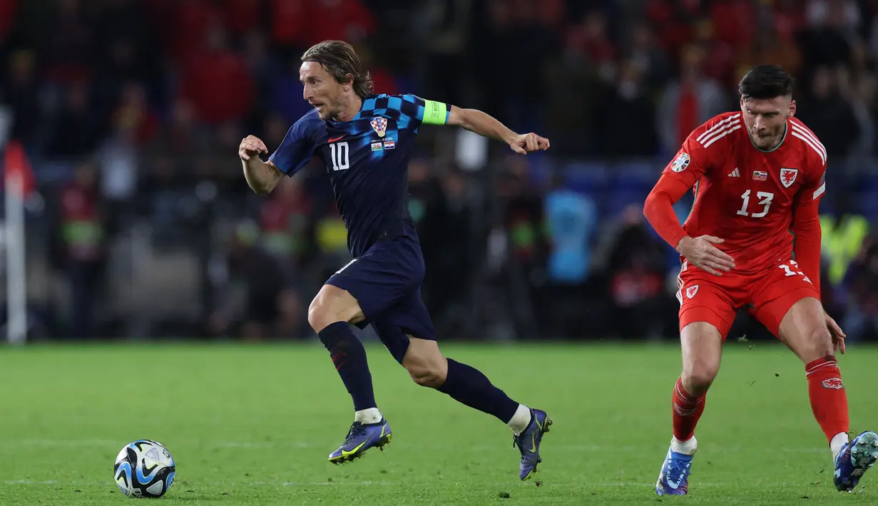 Kemenangan ini membuat wales bersaing ketat dengan Kroasia untuk memperebutkan satu tiket lolos otoamtis ke putaran final EURO 2024. (Adrian DENNIS / AFP)
