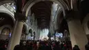 Umat Katolik saat mengikuti Misa Pontifikal Natal di Gereja Katedral Jakarta, Kamis (25/12/2025). (Kapanlagi.com/Budy Santoso)
