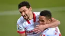 Penyerang Sevilla, Youssef En-Nesyri, merayakan gol yang dicetak ke gawang Alaves pada laga lanjutan Liga Spanyol di Stadion Mendizorrotza, Rabu (20/1/2021) dini hari WIB. Sevilla menang 2-1 atas Alaves. (AFP/Ander Gillenea)