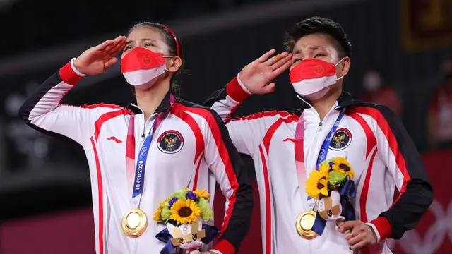 Kemenangan ganda putri bulu tangkis Indonesia Greysia Polii/Apriyani Rahayu di Olimpiade Tokyo 2020.