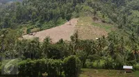 Hutan gundul akibat pembalakan liar di KM 16 di kawasan Hutan Produksi Popayato,  Kabupaten Pohuwato, Gorontalo, Minggu (11/9). Sekitar 16 ribu hektar hutan di Gorontalo rusak terdiri atas hutan lindung dan hutan produksi. (Liputan6.com/Immanuel Antonius)