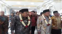 Menko Bidang Perekonomian Darmin Nasution kunjungan kerja ke SMKN 4 Malang, Jawa Timur (Foto: Merdeka.com/Dwi Aditya Putra)
