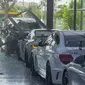 Pengemudi Xpander berinisial JS (42) mengaku kepada siap mengganti kerugian yang dialami oleh showroom mewah Ivan's Motor di kawasan PIK 2, Teluk Naga, Kota Tangerang, Banten setelah mobil Porsche-nya ditabrak hingga ringsek. (Istimewa)
