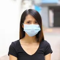 ilustrasi perempuan menggunakan masker/copyright Shutterstock