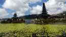 Sementara itu, Pura Ulun Danu Beratan adalah sebuah pura dan candi air besar yang terletak di Bali. Candi ini berlokasi di tepi barat laut Danau Bratan di pegunungan dekat Bedugul, Kabupaten Tabanan. (merdeka.com/Arie Basuki)