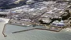 Pemandangan dari udara ini menunjukkan Pembangkit Listrik Tenaga Nuklir (PLTN) Fukushima Daiichi di Fukushima, Jepang, Kamis (24/8/2023). Operator PLTN Fukushima Daiichi, Tokyo Electric Power Company Holdings TEPCO mulai melepaskan gelombang pertama air radioaktif yang telah diolah ke Samudera Pasifik. (Kyodo News via AP)