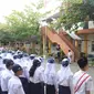 Edukasi Pelajar Sekolah Menengah Pertama Dilarang Mengendarai Sepeda Motor (Dewi Divianta/Liputan6.com)