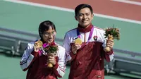 Ni Made Arianti Putri dan Saptoyogo Purnomo menyumbang medali emas untuk Indonesia di ajang Asian Para Games 2022 Hangzhou, China. (Dok NPC Indonesia