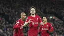 Penyerang Liverpool, Diogo Jota (tengah) berselebrasi usai mencetak gol ke gawang Leicester City pada pertandingan lanjutan Liga Inggris di stadion Anfield di Liverpool, Inggris, Jumat (11/2/2022). Jota mencetak dua gol dan mengantar Liverpool menang atas Leicester City 2-0. (AP Photo/Jon Super)