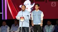 Calon Presiden dan Calon Wakil Presiden nomor urut 2 Prabowo Subianto (kiri) dan Gibran Rakabuming Raka saat memberi pernyataan penutup Debat Kelima Pilpres 2024 di Jakarta Convention Center (JCC), Jakarta, Minggu (4/2/2024). (Liputan6.com/Angga Yuniar)