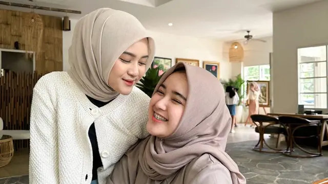 Jastitia Arifania Tauladani dan kakaknya Alifhia Fitri