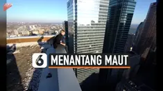 BIKIN NGILU, PRIA MENANTANG MAUT DI PUNCAK GEDUNG PENCAKAR LANGIT
