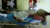 Seorang janda berusia 34 tahun kritis setelah diterkam buaya di Sungai Apung, Kabupaten Kepulauan Meranti, Riau. (Liputan6.com/M Syukur)
