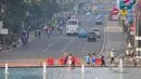 Sejumlah warga memenuhi kawasan Bundaran HI, Jakarta, Minggu (19/4/2015). Beberapa warga mengaku tidak tahu jika car free day ditiadakan selama pelaksanaan Konferensi Asia Afrika (KAA). (Liputan6.com/Faizal Fanani)
