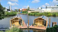 Wikkelboat, rumah-rumah perahu berbahan karton di pelabuhan Rotterdam, Belanda. (Facebook/Wikkelboat)