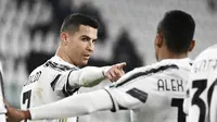 Cristiano Ronaldo dari Juventus melakukan selebrasi setelah mencetak gol dalam pertandingan Liga Italia lawan Crotone, di Allianz Stadium di Turin, Italia, Senin, 22 Februari 2021. (Marco Alpozzi / LaPresse via AP)