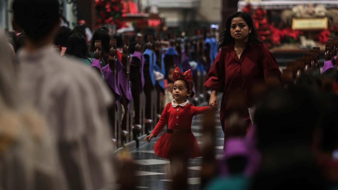Keceriaan Anak-Anak Ikuti Misa Natal di Gereja Katedral Jakarta