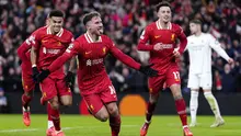 Gelandang Liverpool,&nbsp;Alexis Mac Allister, menyumbangkan satu gol saat timnya menang 2-0 atas Real Madrid pada laga kelima league phase Liga Champions musim ini di Stadion Anfield, Kamis (28/11/2024) dini hari WIB. (Peter Byrne/PA via AP)