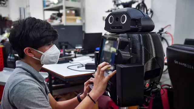 RS Thailand Kerahkan Robot Perangi Pasien Virus Corona