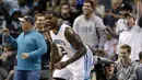Ekspresi pemain Charlotte Hornets, Marvin Williams usai melakukan dunk saat melawan Miami Heat pada laga NBA di Spectrum Center, (29/12/2016). Hornets menang 91-82. (AP/Nell Redmond)