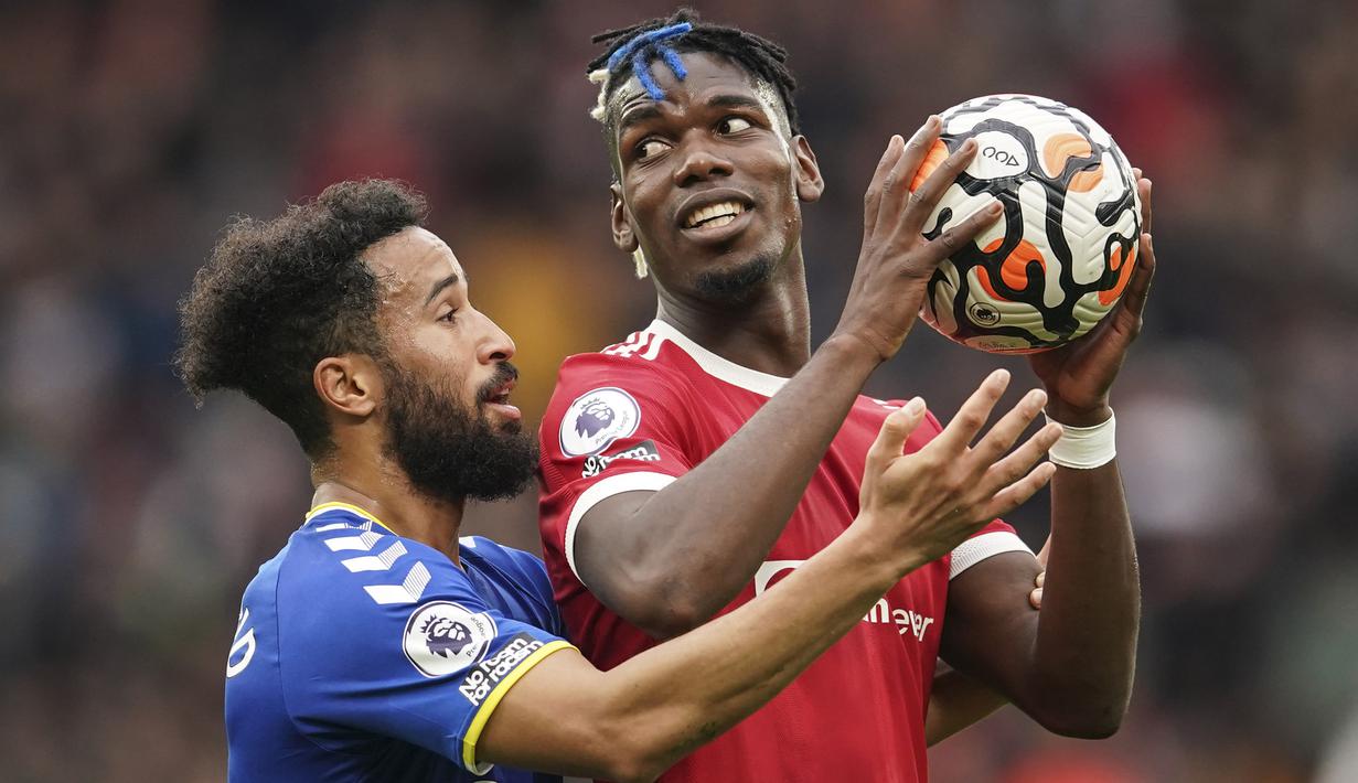 Paul Pogba. Pada periode keduanya mmperkuat Manchester United, ia didatangkan dari Juventus pada 2016/2017 dengan nilai transfer sebesar 105 juta euro atau setara Rp.1,7 triliun. Memasuki musim ke-6, ia telah tampil dalam 208 laga dengan mencetak 38 gol dan 49 assist. (AP/Pool/Dave Thompson)