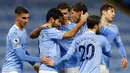 Para pemain Manchester City merayakan gol yang dicetak oleh Ilkay Gundogan ke gawang Newcastle United pada laga Liga Inggris di Stadion Etihad, Sabtu (26/12/2020). City menang dengan skor 2-0. (Jason Cairnduff/ Pool via AP)