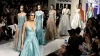 Sejumlah model mengenakan busana karya desainer Shady Zeineldine saat pembukaan Beirut Fashion Week di Lebanon 19 April 2016. Shady Zeineldine merupakan desainer asal Lebanon. (REUTERS / Mohamed Azakir)