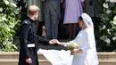 Jessica dan Ben sendiri hadir dalam pernikahan Meghan Markle dan Pangeran Harry di kursi bagian depan. (BEN STANSALL  POOL  AFP)