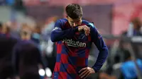 Gerard Pique lesu saat Barcelona dikalahkan Bayern Munchen pada perempat final Liga Champions. (Rafael Marchante / POOL / AFP)