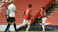 Jesse Lingard merayakan gol ke gawang LASK pada leg kedua 16 besar Liga Europa 2019/2020 di Old Trafford, Kamis (6/8/2020) dini hari. (AFP/Oli Scarff)