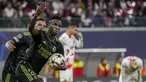 Penyerang Real Madrid Vinicius Junior melakukan selebrasi usai mencetak gol pertama timnya ke gawang RB Leipzig pada pekan ke-5 Grup F Liga Champions 2022/2023 di Red Bull Arena, Rabu (26/10/2022) dinihari WIB.  Status tak terkalahkan Real Madrid di seluruh ajang akhirnya terhenti. (AP Photo/Matthias Schrader)