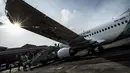 Pesawat Garuda Indonesia disiapkan di Bandara I Gusti Ngurah Rai, Denpasar, Bali, Jumat (24/10/2014), untuk penerbangan perdananya dengan tujuan Dili, Timor Leste. (Antara Foto/Rosa Panggabean)
