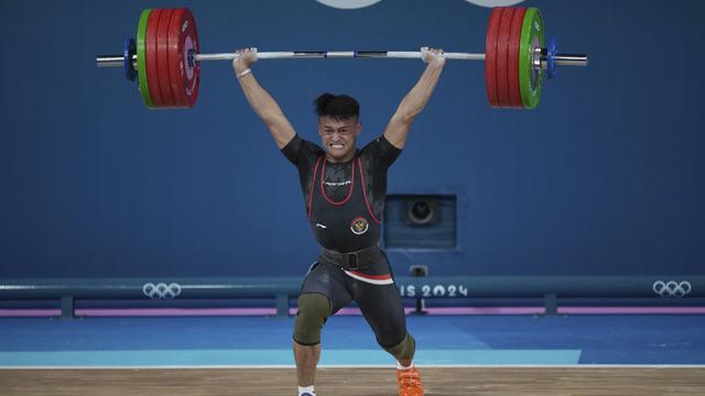 Foto: Pecahkan Rekor Olimpiade, Rizki Juniansyah Sumbang Emas Kedua Indonesia di Olimpiade Paris 2024